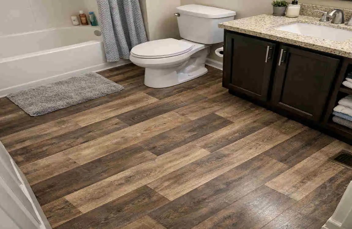 can you put laminate in home bathroom